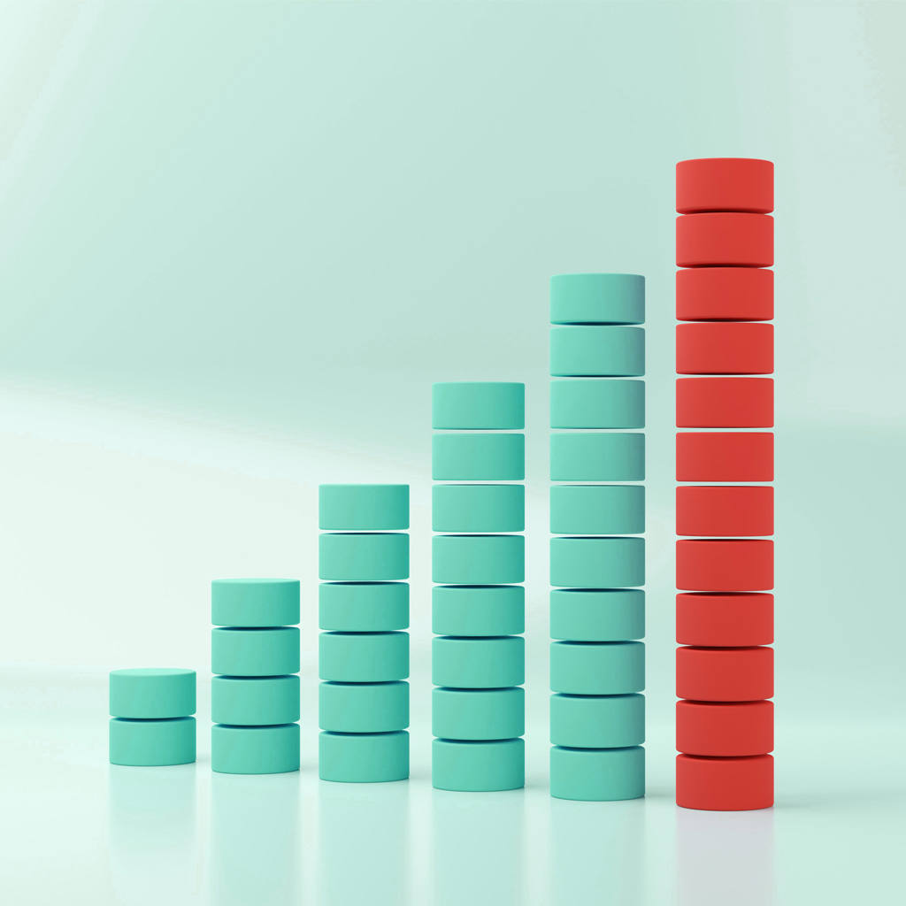 Five stacks of counters in blue, one stack of counters in red, beside eachother, going up in ascending order Five stacks of counters in blue, one stack of counters in red, beside eachother, going up in ascending order